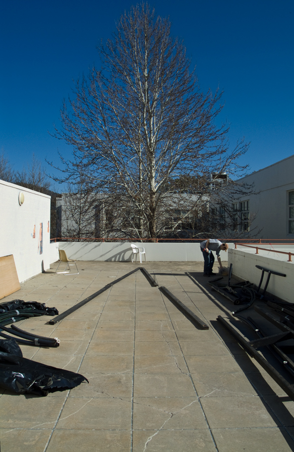 Interior of Carbon Obscura with sun projections but no fog - on the deck outside Photospace Gallery ANU, Lloyd Godman